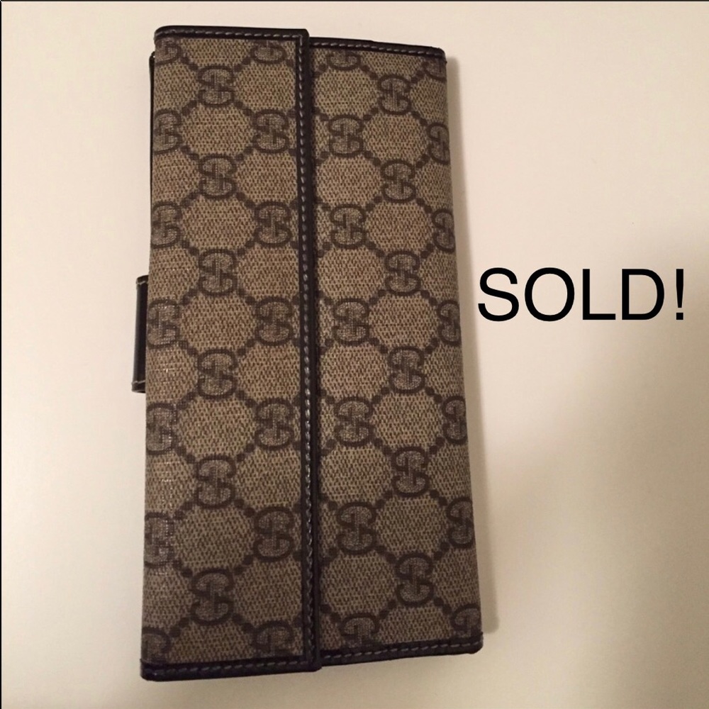 Authentic Gucci checkbook wallet with coin pouch